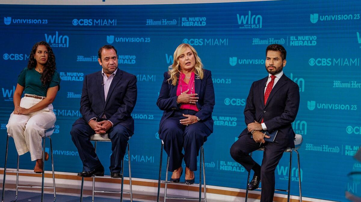 Jose Aristimuno on a televised panel with Univision 23, CBS Miami, Miami Herald and WLRN branding